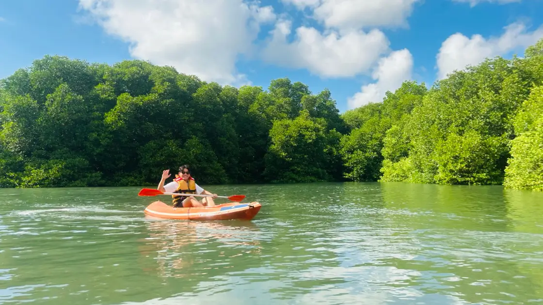 A traveler is satisfied with his canoe tour