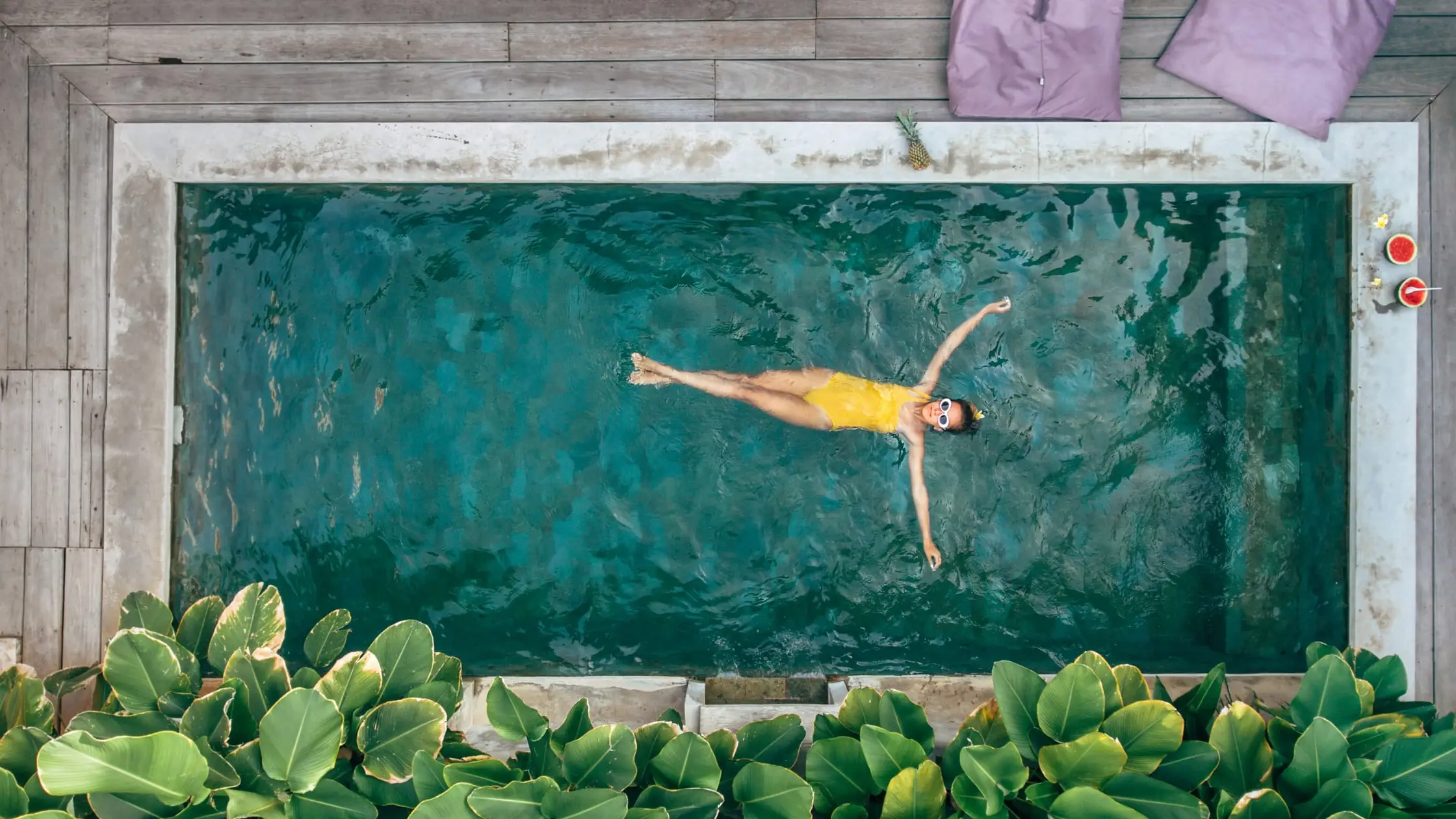 Girl Relaxing in Pool on Bali Luxury Villa